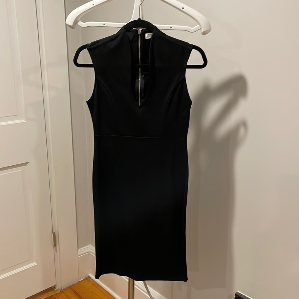 Black mini body on dress with low neckline